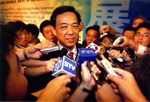 中国商务部部长薄熙来回答记者有关中美纺织品贸易的问题
